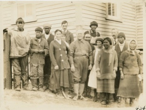 Image: Eskimos [Inuit], Moravians, and Dr. Fernald in front of MacMillans dental clinic of the